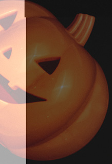 Three pumpkins are placed on a black background.

AI generated content